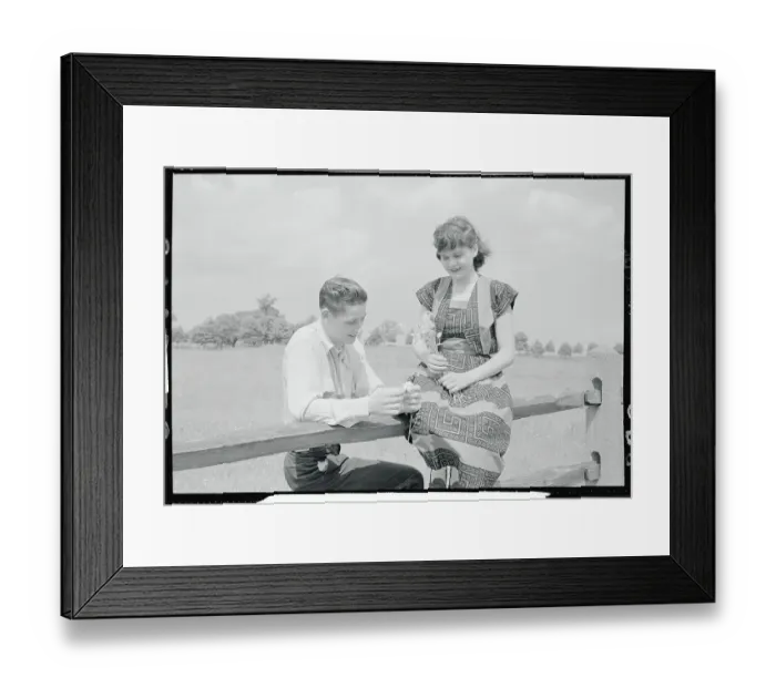 Framed Print : Bob Sulat and Mary Ellen Holding Flowers Framed Print : Bob Sulat and Mary Ellen Holding Flowers