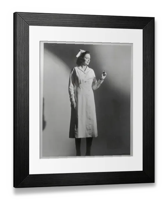 Framed Print : Nurse Reading Thermometer Framed Print : Nurse Reading Thermometer