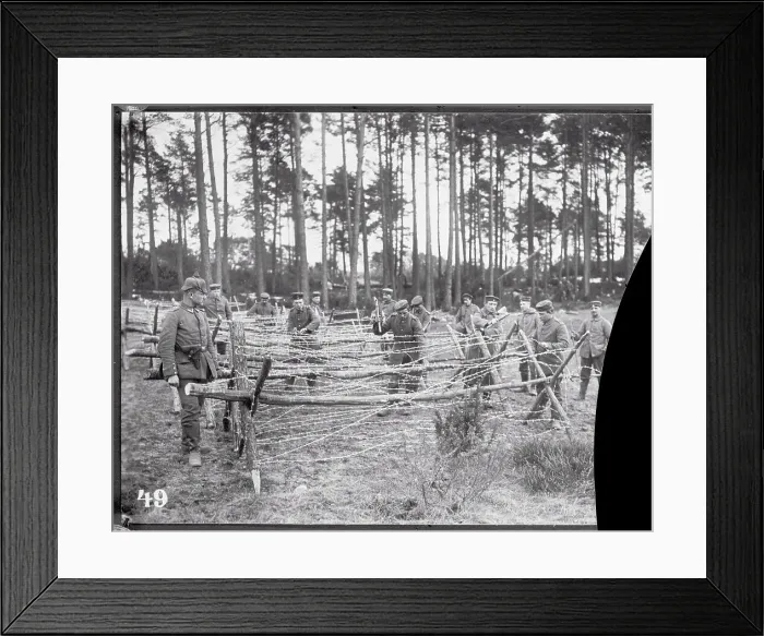 Framed Print : Soldiers Assembling Barbed Wire Framed Print : Soldiers Assembling Barbed Wire