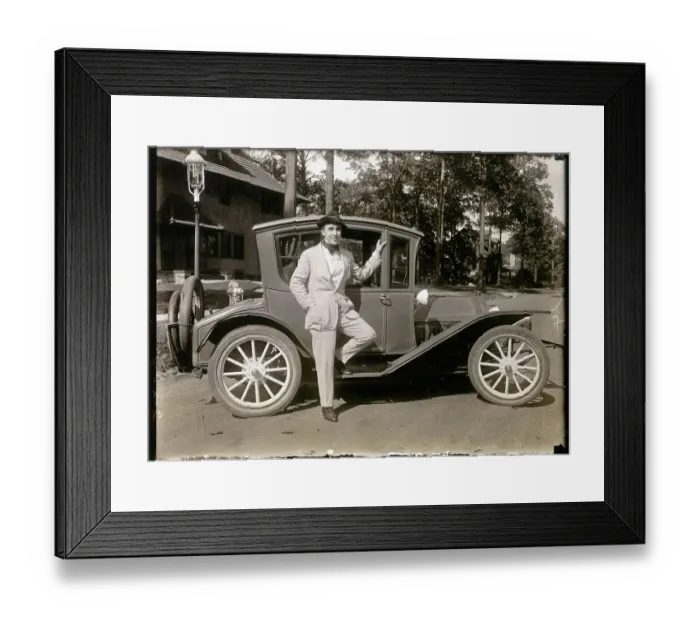 Framed Print : Man Posing with Roadster