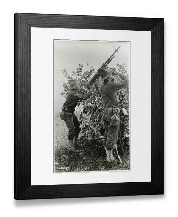 Framed Print : Soldier Aiming Antiaircraft Gun with Buddy Using Binoculars
