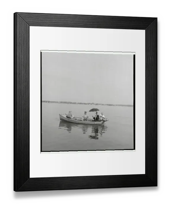 Framed Print : Walker Evans Sitting in Boat and Holding Umbrella Framed Print : Walker Evans Sitting in Boat and Holding Umbrella