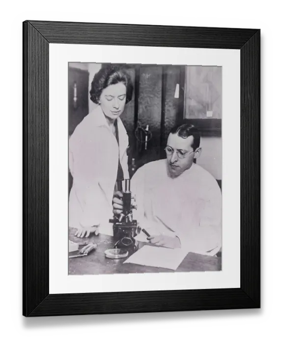 Framed Print : Dr. Isidore and His wife Working in Lab