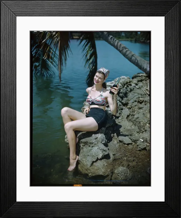 Framed Print : Woman Holding a Soda Bottle Framed Print : Woman Holding a Soda Bottle