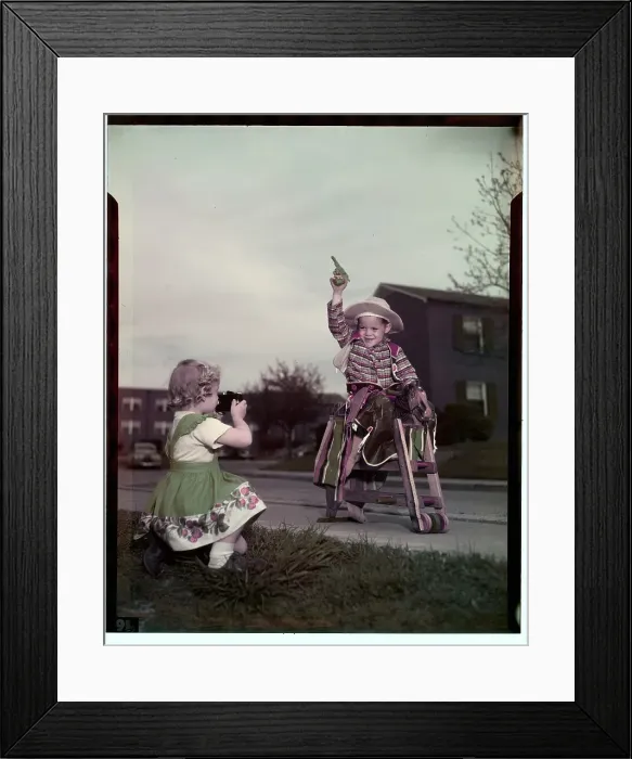 Framed Print : Girl Photographing Her Brother Framed Print : Girl Photographing Her Brother