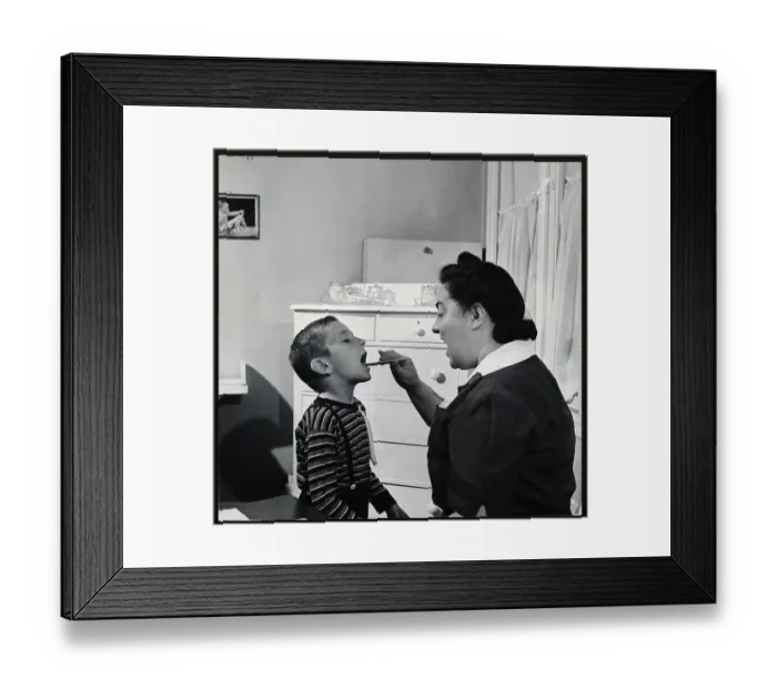 Framed Print : Nurse Examining Child Framed Print : Nurse Examining Child