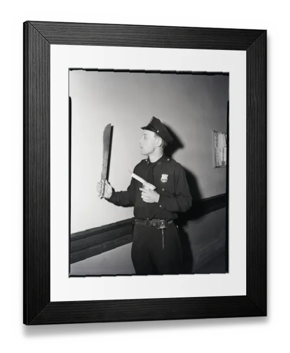 Framed Print : Policeman Holding Weapons Framed Print : Policeman Holding Weapons