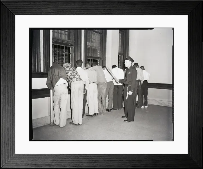 Framed Print : Policeman Arresting African-American Teens Framed Print : Policeman Arresting African-American Teens