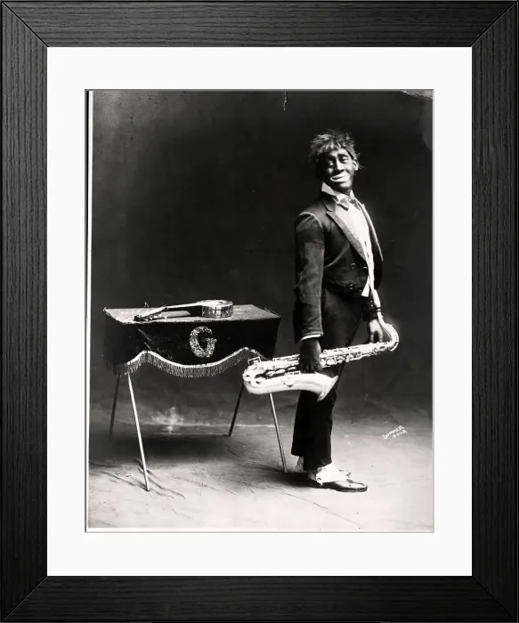 Framed Print : Minstrel Performer Holding Saxophone Framed Print : Minstrel Performer Holding Saxophone