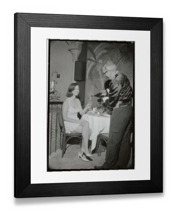 Framed Print : Customer Being Served at El Morocco