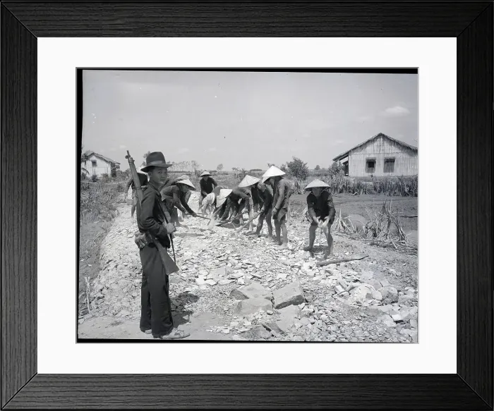 Framed Print : Soldier Guarding Farmers Building Road Framed Print : Soldier Guarding Farmers Building Road