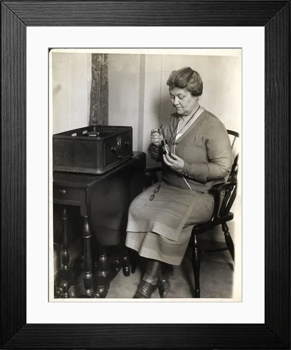 Framed Print : Woman Repairs Vacuum Tube For Radio Framed Print : Woman Repairs Vacuum Tube For Radio