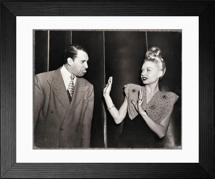 Framed Print : Man And Woman Pose As They Make Faces Framed Print : Man And Woman Pose As They Make Faces