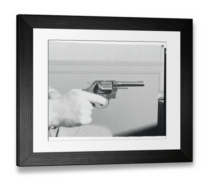 Framed Print : Hand Holding Colt.38 Special Revolver