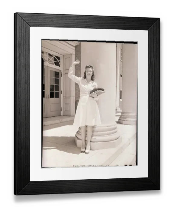Framed Print : Young Woman Holding Books