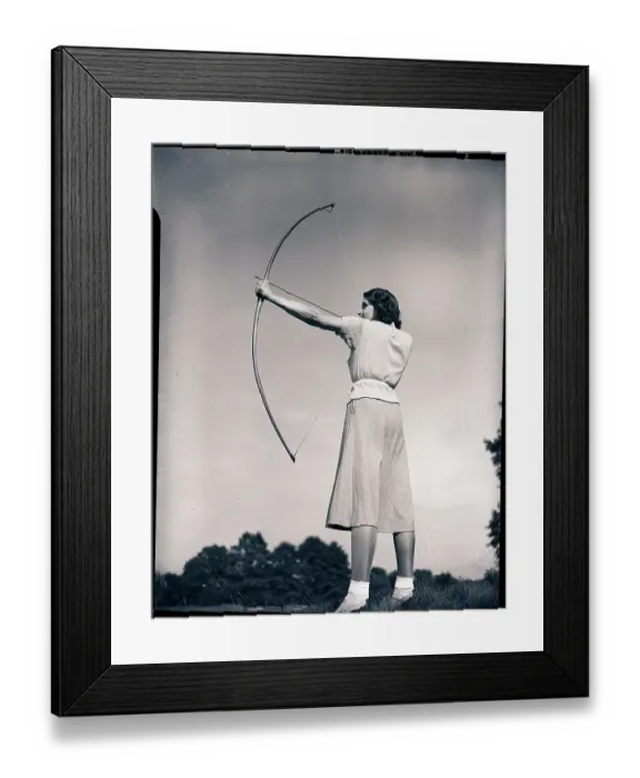 Framed Print : Woman Aiming Bow and Arrow Framed Print : Woman Aiming Bow and Arrow