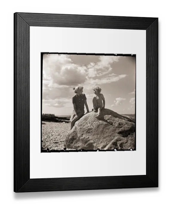 Framed Print : Mother and Child on Rock at Beach Framed Print : Mother and Child on Rock at Beach