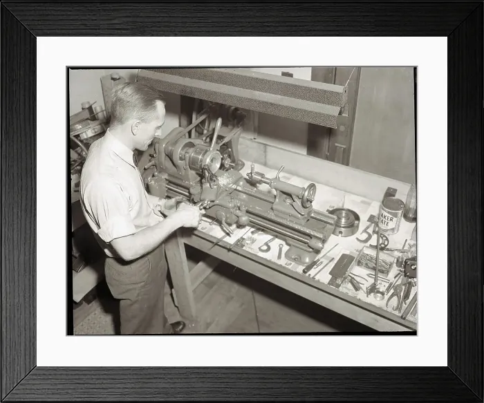 Framed Print : Man Working with Lathe in Basement Workshop