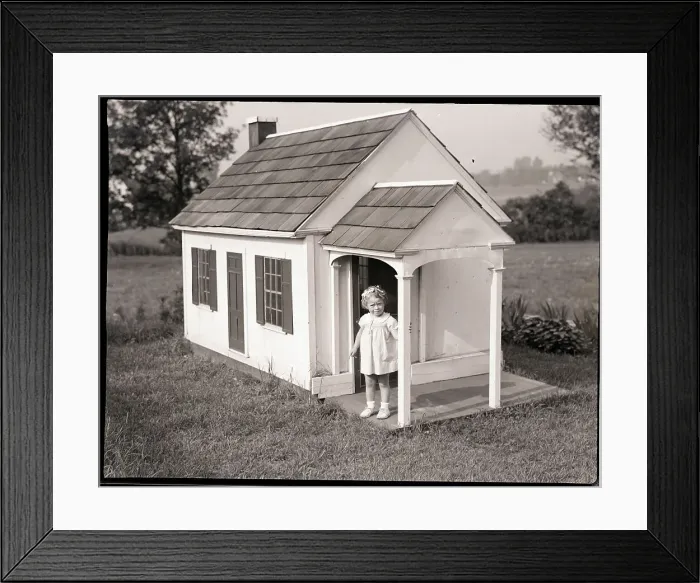 Framed Print : Girl In Dollhouse On Lawn Framed Print : Girl In Dollhouse On Lawn
