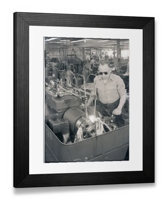 Framed Print : Man Working a Lathe