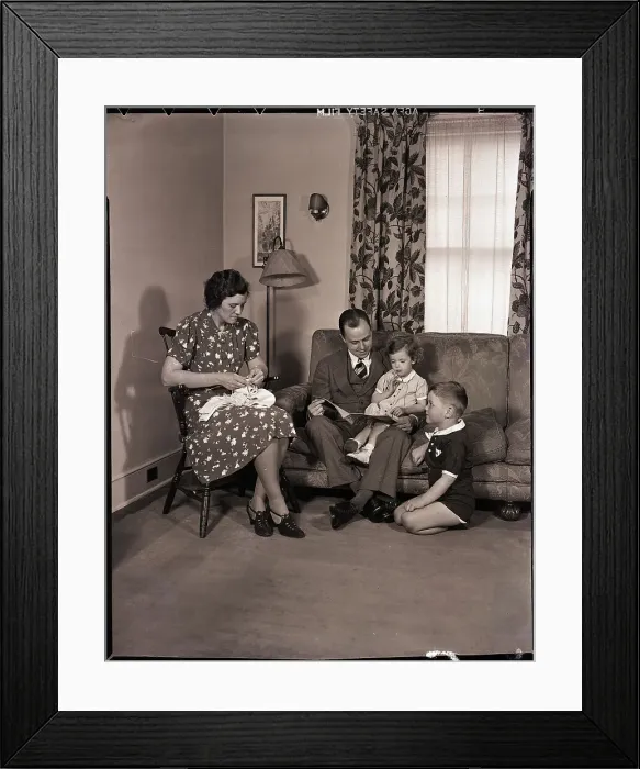 Framed Print : Family Sitting in Living Room