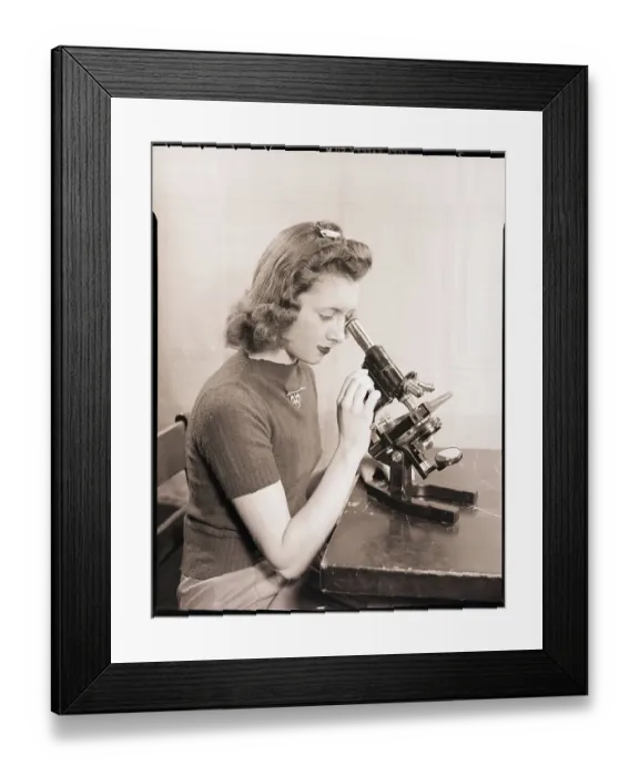 Framed Print : Teenager Looking Through Microscope Framed Print : Teenager Looking Through Microscope