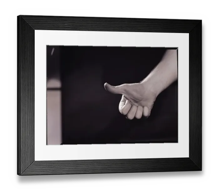 Framed Print : Thumbs Up. (Original Caption). Photo shows a raised thumb, or a hitch-hiker's thumb Framed Print : Thumbs Up. (Original Caption). Photo shows a raised thumb, or a hitch-hiker's thumb