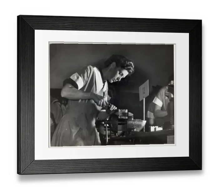 Framed Print : Low Angle Woman Scrapes Bearing In Class Framed Print : Low Angle Woman Scrapes Bearing In Class
