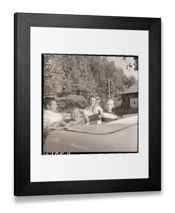 Framed Print : Family Drives Away In Convertible Framed Print : Family Drives Away In Convertible