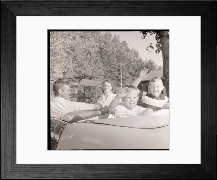 Framed Print : Family Drives Away In Convertible Framed Print : Family Drives Away In Convertible