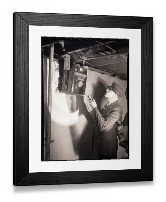 Framed Print : Man Reading Gas Meter in Basement Framed Print : Man Reading Gas Meter in Basement