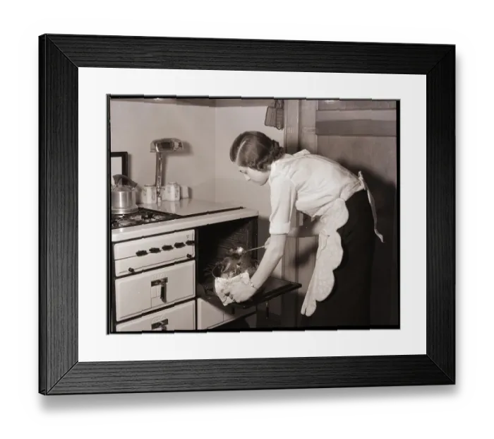 Framed Print : Woman Roasting a Turkey Framed Print : Woman Roasting a Turkey
