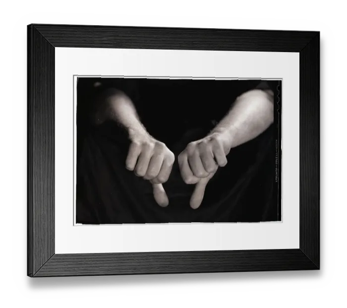 Framed Print : Thumbs Pointing Downwards Framed Print : Thumbs Pointing Downwards