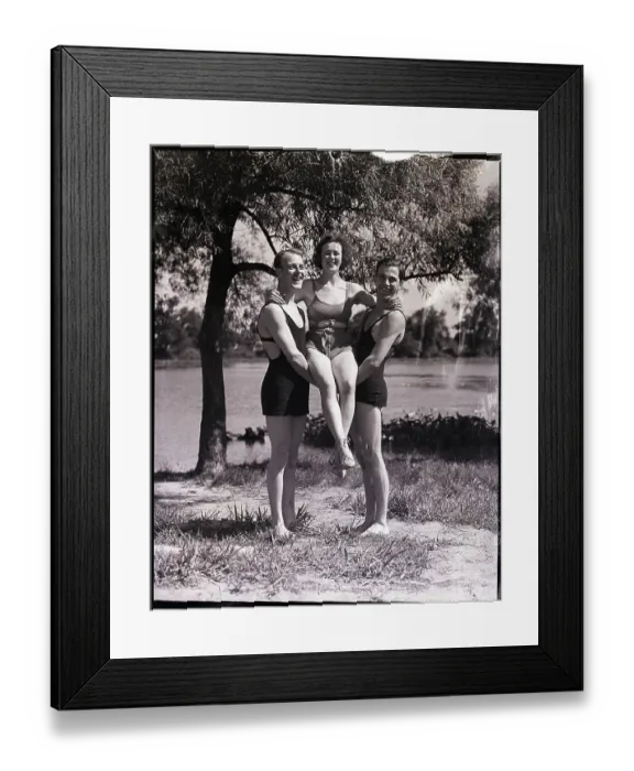 Framed Print : Male Gymnasts Holding up a Woman Framed Print : Male Gymnasts Holding up a Woman