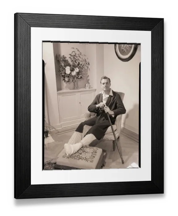 Framed Print : Seated Man with Injured Foot Holding Cane Framed Print : Seated Man with Injured Foot Holding Cane
