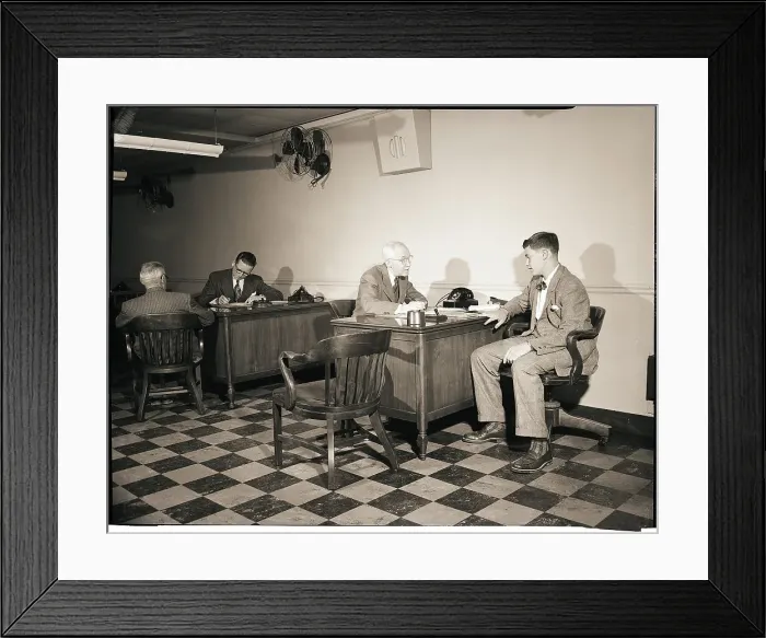 Framed Print : Young Man Talks To Banker