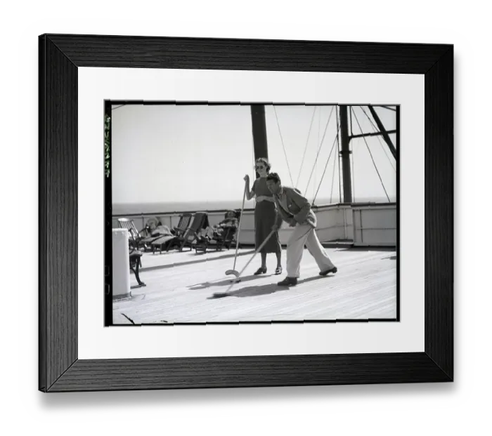 Framed Print : Couple Playing Shuffle Board on Ocean Liner Framed Print : Couple Playing Shuffle Board on Ocean Liner