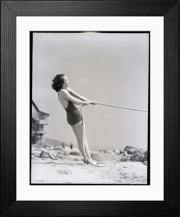 Framed Print : Woman in Bathing Suit Pulling Rope Framed Print : Woman in Bathing Suit Pulling Rope