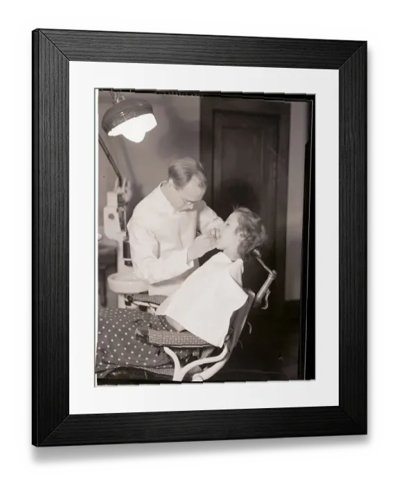 Framed Print : Dentist Examining Patients Teeth Framed Print : Dentist Examining Patients Teeth