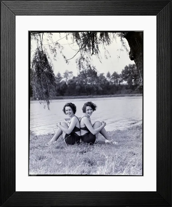 Framed Print : Twin Sisters Sitting Back to Back Framed Print : Twin Sisters Sitting Back to Back