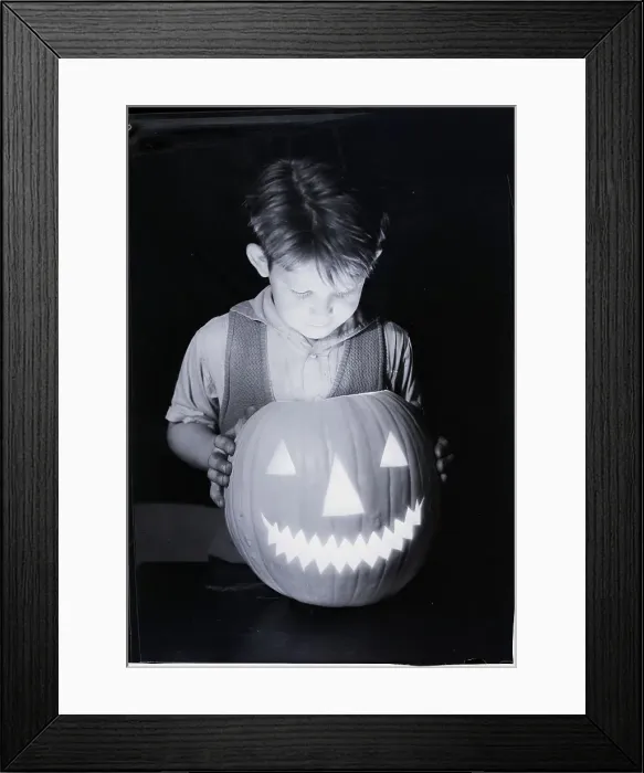 Framed Print : Boy Holding Jack-o'-lantern Framed Print : Boy Holding Jack-o'-lantern