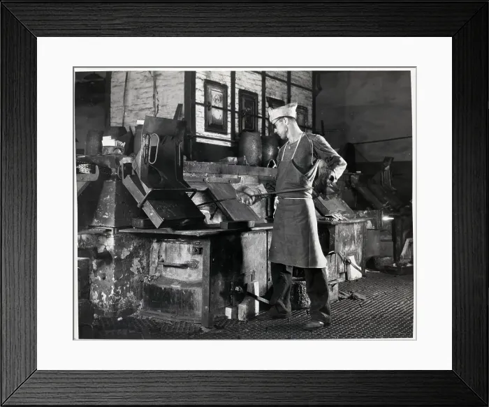 Framed Print : Stirring Molten Metal Before Pouring Framed Print : Stirring Molten Metal Before Pouring