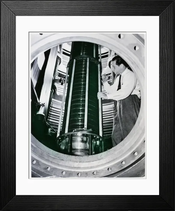 Framed Print : Man in Charge of Cyclotron Tests Tube Framed Print : Man in Charge of Cyclotron Tests Tube