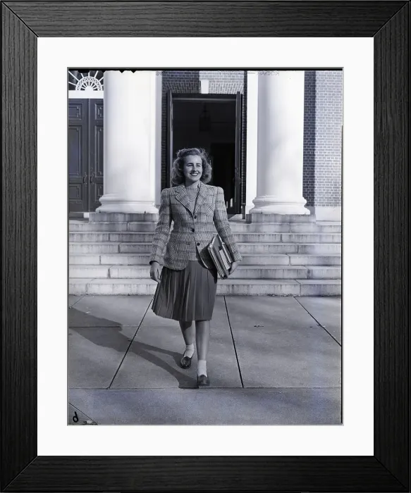 Framed Print : Female College Student Carrying Books Framed Print : Female College Student Carrying Books