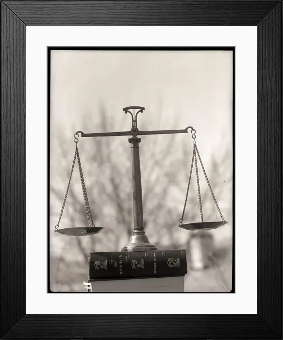 Framed Print : Balance Scales Perched On Book Framed Print : Balance Scales Perched On Book