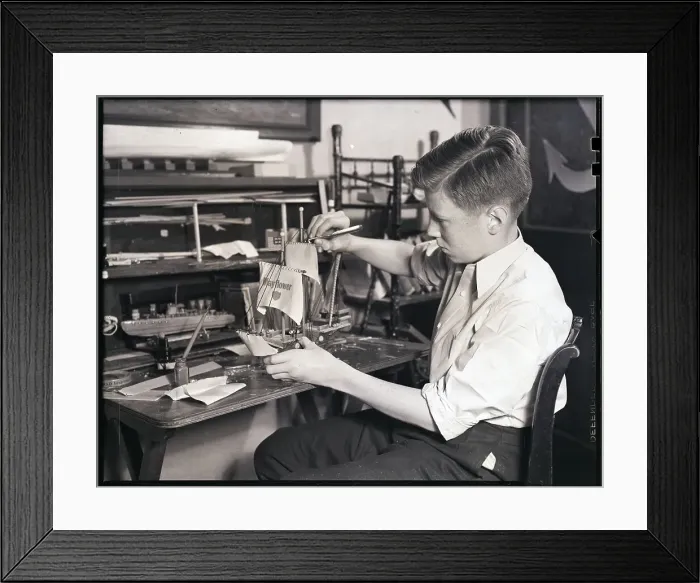 Framed Print : Boy Building a Model Ship Framed Print : Boy Building a Model Ship