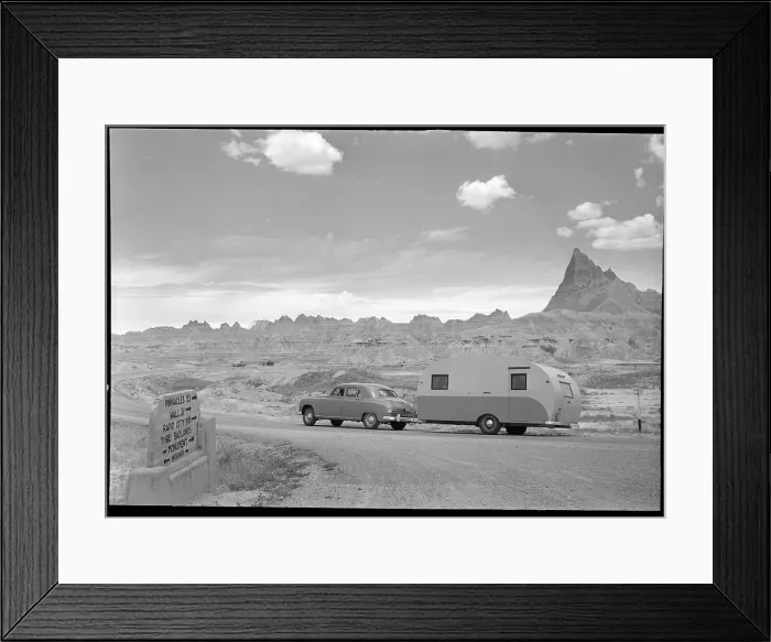 Framed Print : Automobile & Trailer On Badlands Highway Framed Print : Automobile & Trailer On Badlands Highway