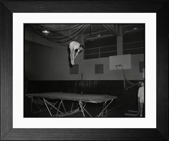 Framed Print : Boy Shown Tubling On Trampoline Framed Print : Boy Shown Tubling On Trampoline