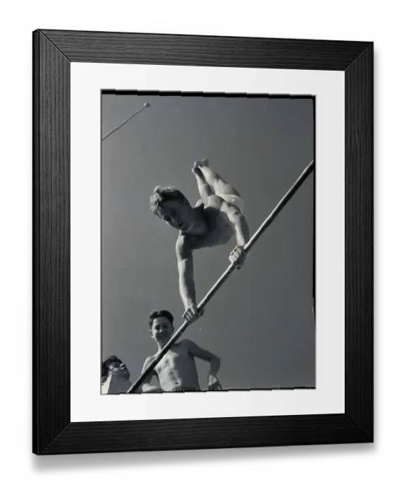 Framed Print : Gymnast Swinging on High Bar Framed Print : Gymnast Swinging on High Bar