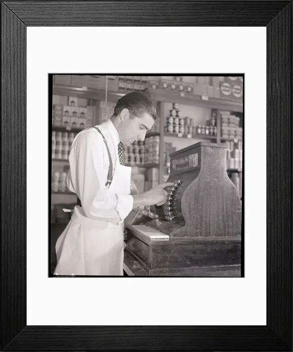 Framed Print : Grocer At Cash Register Framed Print : Grocer At Cash Register